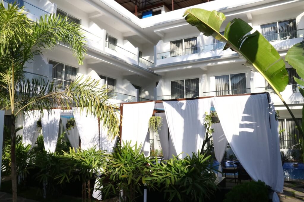 La Vera Boutique Hotel near Mandrem Beach Goa surrounded by tropical greenery and outdoor seating